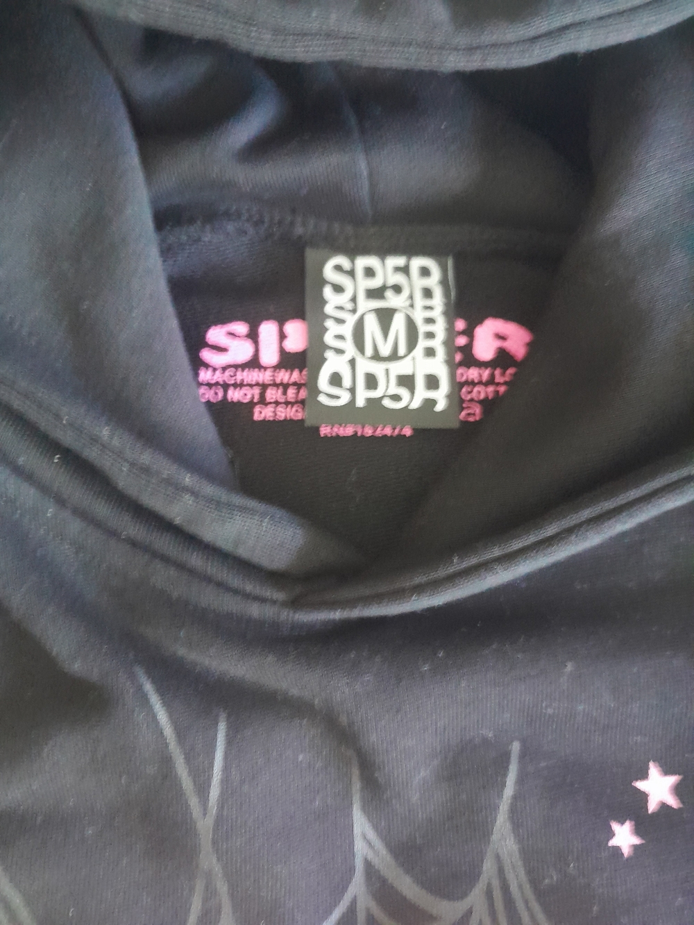 SP5DER Black Graphic Hoodie with Pink Stars